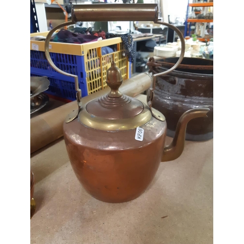 160 - Three pieces of metalware to include a hammered copper bucket, Victorian style copper and brass kett... 