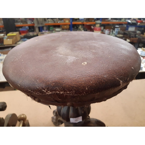 164 - A Victorian heavily carved mahogany adjustable piano stool - measuring approx. 48cm high (see condit... 