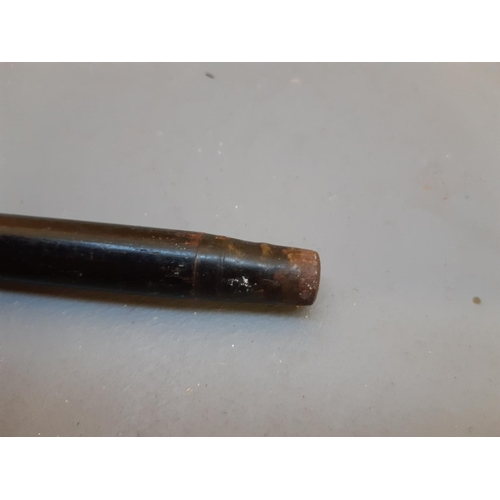 175 - A 19th century ebony walking cane with hallmarked silver top