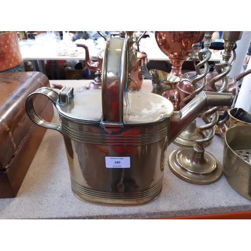 180 - A collection of assorted metalware to include Victorian copper kettle, copper and brass samovar, Art... 