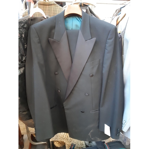 190 - Three items of as new men's clothing to include a Paul Berman size 46 suit jacket, Marks & Spencer t... 
