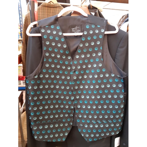 190 - Three items of as new men's clothing to include a Paul Berman size 46 suit jacket, Marks & Spencer t... 