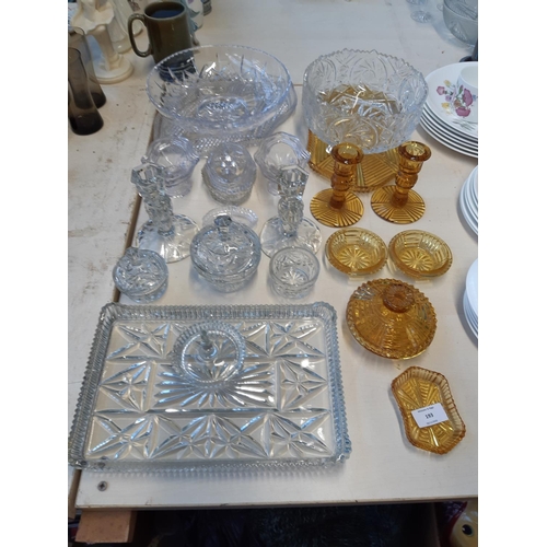 193 - A collection of mixed glassware to include seven piece amber glass dressing table set, cut glass fru... 