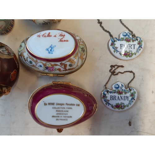 195 - Fifteen miniature porcelain items to include a Tiffany & Co. hand painted porcelain egg trinket box ... 