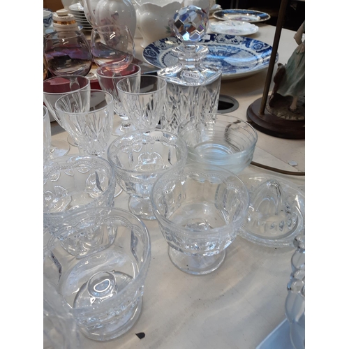 198 - A large collection of assorted glassware to include a boxed set of 4 Royal Doulton champagne flutes,... 