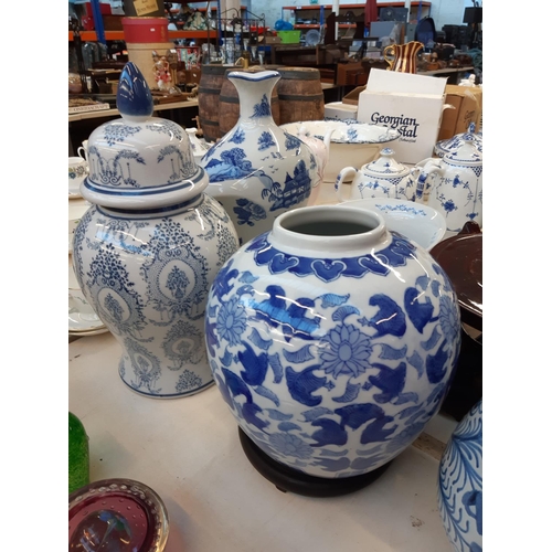 202 - A large quantity of various blue and white china to include Adam & Eve bowl, oriental ginger jar, or... 