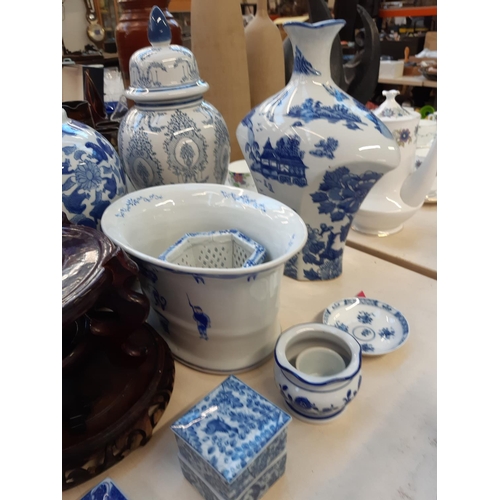 202 - A large quantity of various blue and white china to include Adam & Eve bowl, oriental ginger jar, or... 