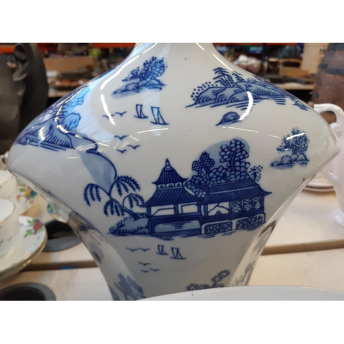 202 - A large quantity of various blue and white china to include Adam & Eve bowl, oriental ginger jar, or... 