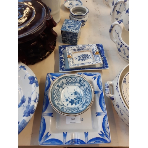 202 - A large quantity of various blue and white china to include Adam & Eve bowl, oriental ginger jar, or... 