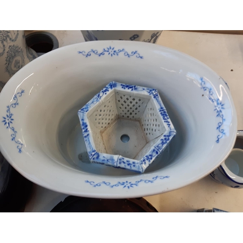 202 - A large quantity of various blue and white china to include Adam & Eve bowl, oriental ginger jar, or... 