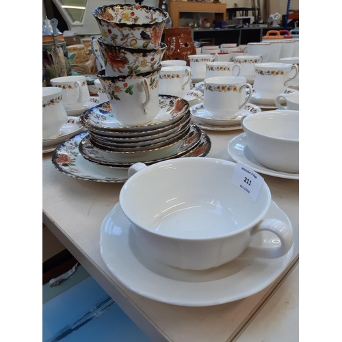 211 - A collection of mixed china to include 5 Royal Doulton Hallmark pattern soup bowls and saucers, 12 R... 