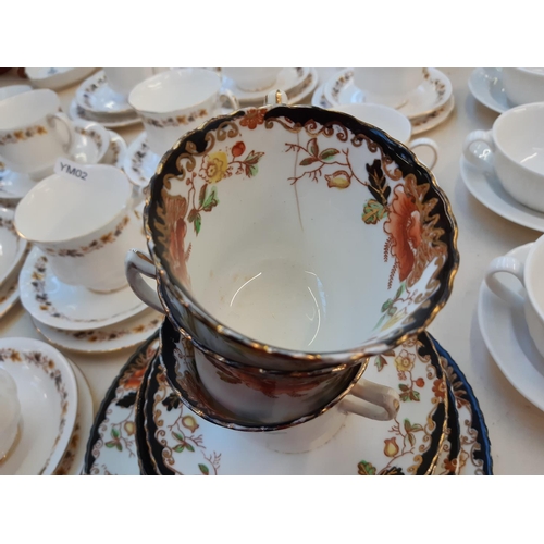 211 - A collection of mixed china to include 5 Royal Doulton Hallmark pattern soup bowls and saucers, 12 R... 