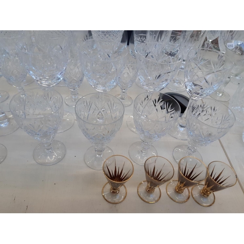 219 - A collection of cut crystal glassware to include 4 Dartington stemless wine glasses, tumblers, sherr... 