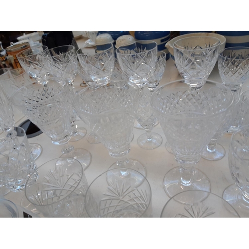 219 - A collection of cut crystal glassware to include 4 Dartington stemless wine glasses, tumblers, sherr... 