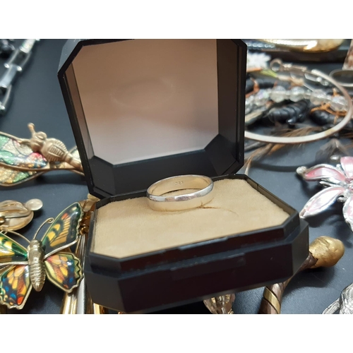 64 - A box containing various costume jewellery and a boxed hallmarked 925 silver band ring