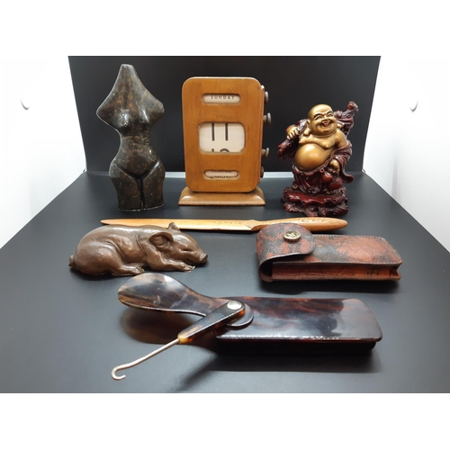 76 - Six collectable items to include a vintage 1930s oak desk calendar, buddha figurine, carved wooden l... 