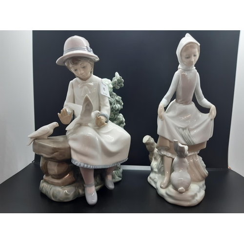 91 - Two Spanish porcelain figurines to include a Lladro seated girl with rabbit and a Nao seated girl wi... 