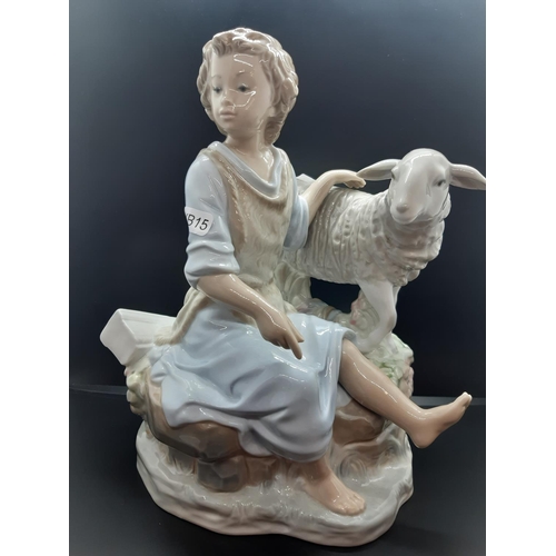 92 - A large Spanish Zaphir porcelain figurine of a seated girl with lamb - measuring approx. 28cm high