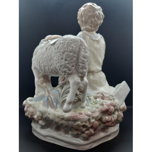 92 - A large Spanish Zaphir porcelain figurine of a seated girl with lamb - measuring approx. 28cm high