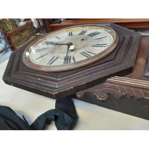 252 - An American Ansonia Clock Company of New York oak cased 8 day wall clock with Roman numerals, pendul... 