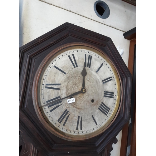 252 - An American Ansonia Clock Company of New York oak cased 8 day wall clock with Roman numerals, pendul... 