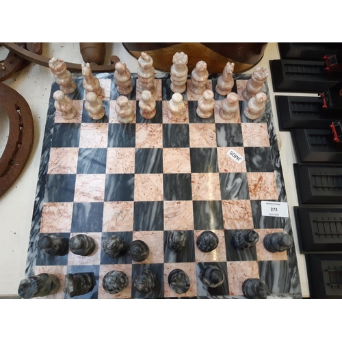 272 - A marble and granite chess set (one piece missing)