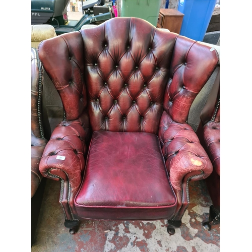 643 - A vintage oxblood leather Chesterfield armchair (see condition report)