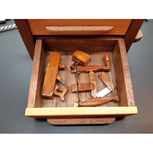 83 - Various collectables to include miniature pen knives, handmade miniature workbench with tools, cuffl... 