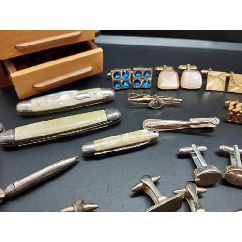 83 - Various collectables to include miniature pen knives, handmade miniature workbench with tools, cuffl... 