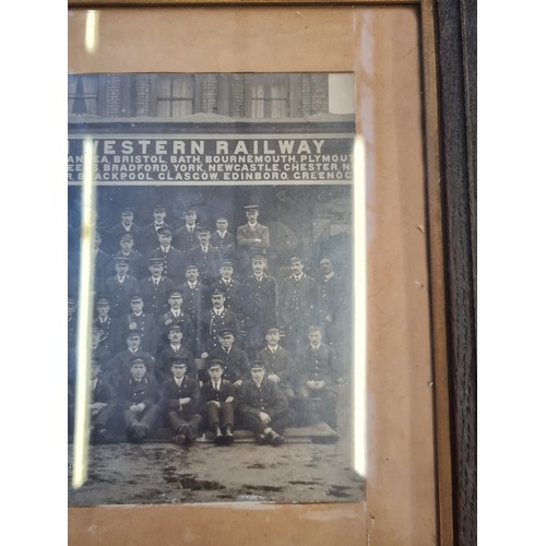 268 - A collection of railwayana to include an oak framed London and North Western Railway staff photograp... 