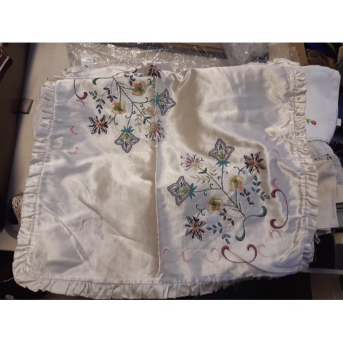 289 - A collection of embroidered linen to include silk pillowcase, table runner etc.