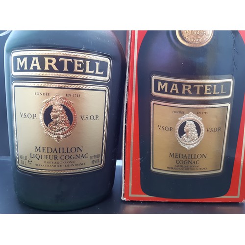A boxed early s 1.l Imperial Quart bottle of Martell