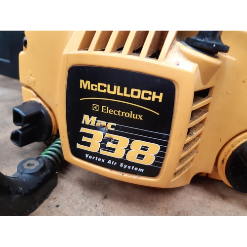 1050 - A black and yellow McCulloch/Electrolux MAC338 petrol chainsaw with 15