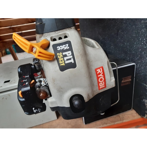 1059 - A grey and black Ryobi 2543Y petrol strimmer