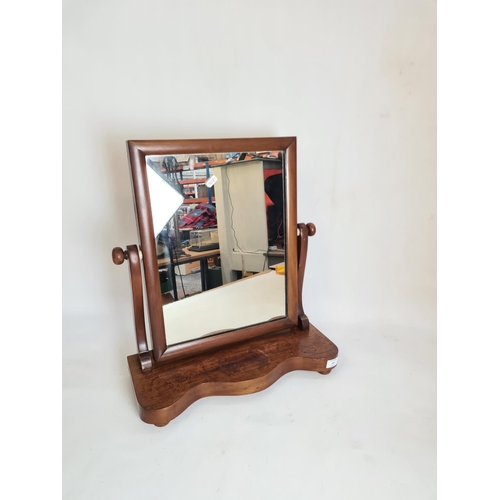 107 - A Victorian mahogany toilet mirror