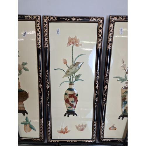 108 - Ten various oriental framed pictures to include three precious stone effect floral panels, black and... 