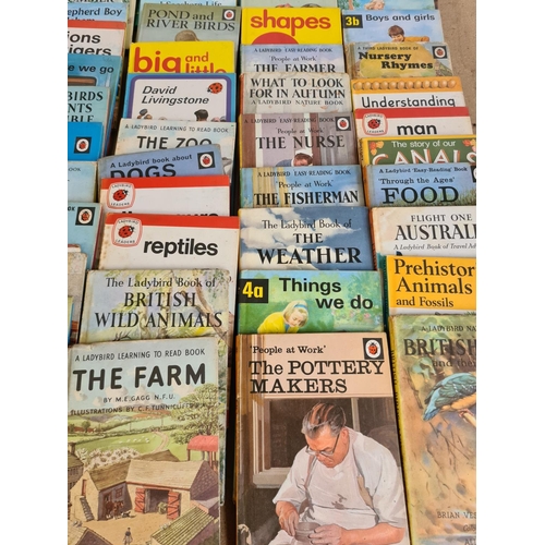 110 - A large collection of vintage Ladybird books to include The Policeman, The Postman, The Sailor etc.