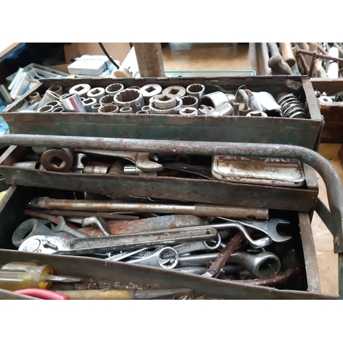 1101 - A blue metal cantilever toolbox containing Gordon, Gedore, Kamasa spanners, Britool sockets, ½