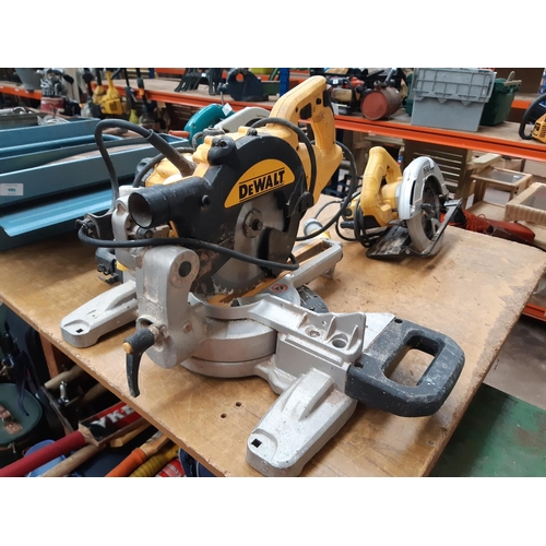 1104 - A black and yellow DeWalt DW5773-LX 110v chop saw