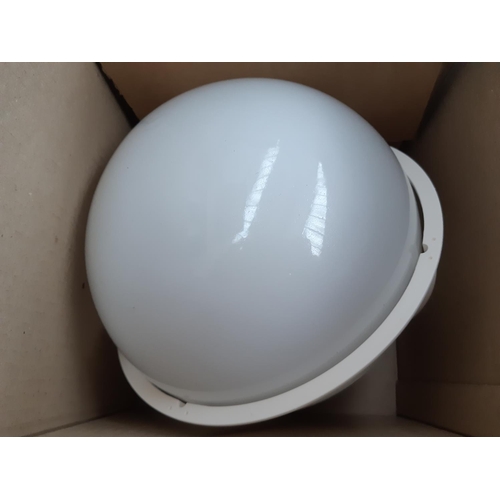 1121 - A boxed Wickes Exit-On premium globe exterior light with PIR motion detector