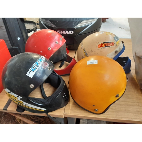 1126 - Four vintage crash helmets