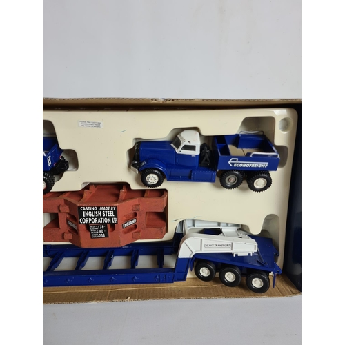 123 - A boxed Corgi Classics Pickfords Diamond T Ballast (x2) with 24 wheel Girder trailer and steel casti... 