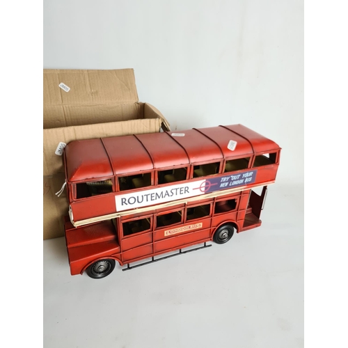 127 - A tin plated traditional red double decker London bus - approx. 38cm long and 23cm high