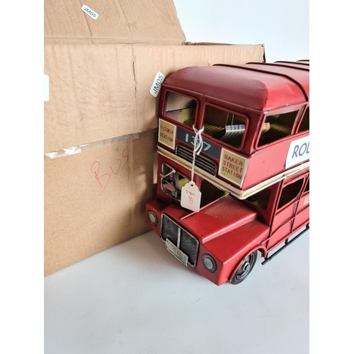 127 - A tin plated traditional red double decker London bus - approx. 38cm long and 23cm high