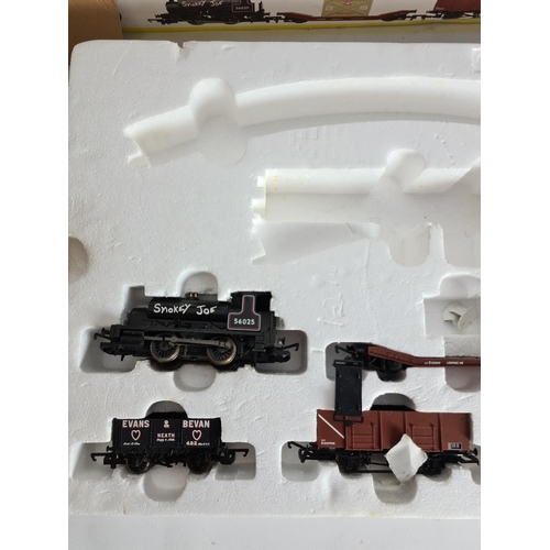 130 - A part complete Hornby Smokey Joe 00 gauge electric train set