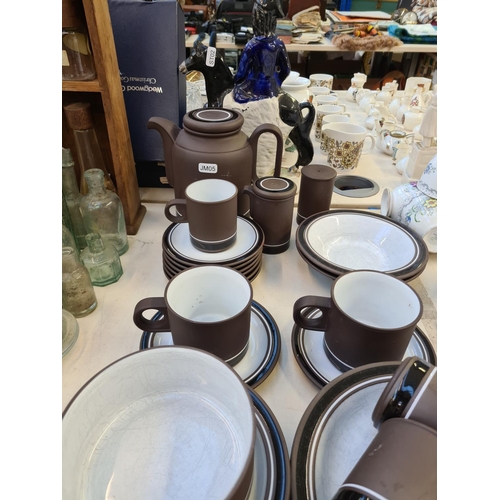 140 - 38 pieces of Hornsea pottery dinner ware comprising coffee cups, teapot, oval serving plate etc.