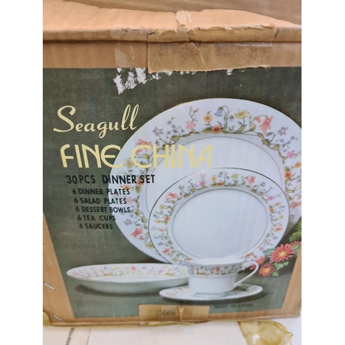 151 - A boxed Crown Ming fine china 30 piece dinner set