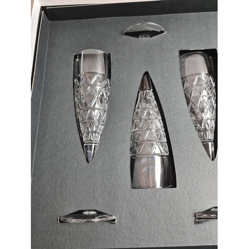 168 - A boxed set of four Royal Doulton Oblique lead crystal champagne flutes