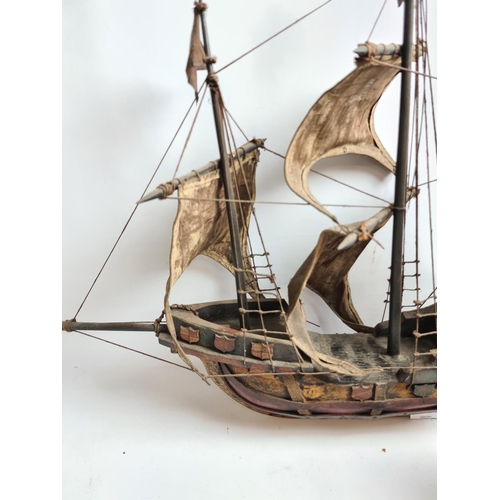 182 - Three wooden model ships