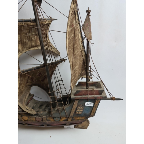 182 - Three wooden model ships